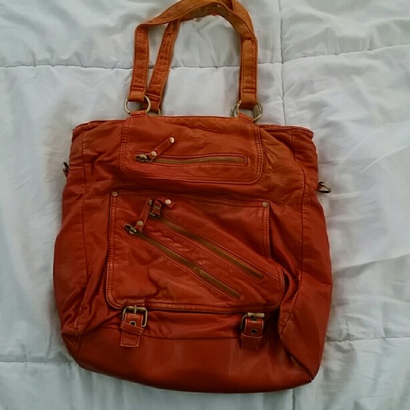 Orange purse with zipper details