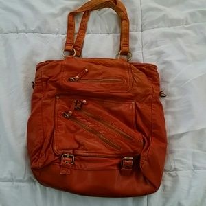 Orange purse with zipper details