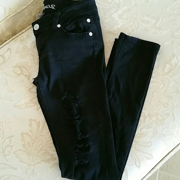 Black jeans with designer cuts