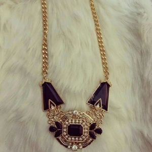 Golden and black statement necklace