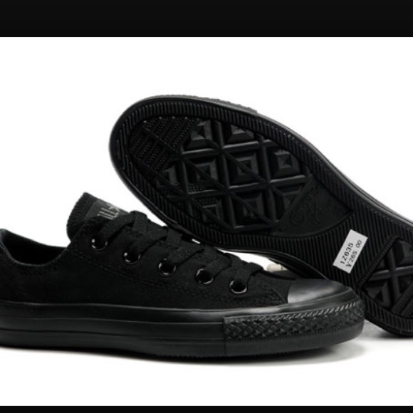 Black on black low top converse.