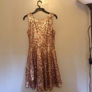 Gold sequin sleeveless dress. Super cute!