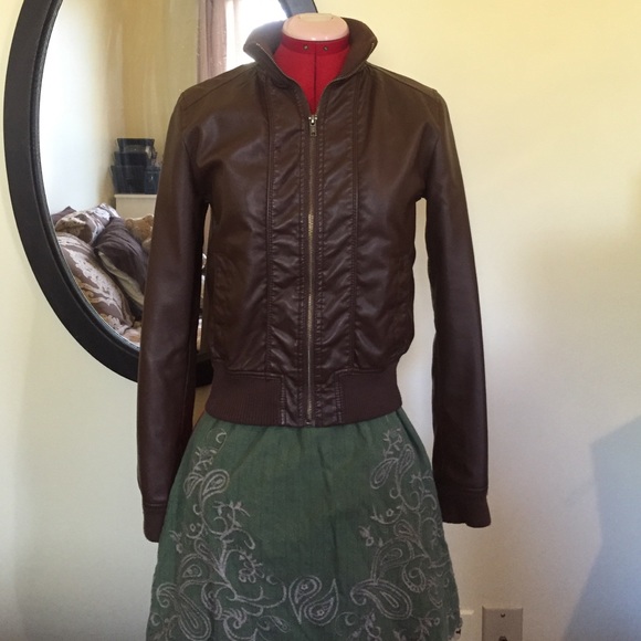 Brown bomber jacket.