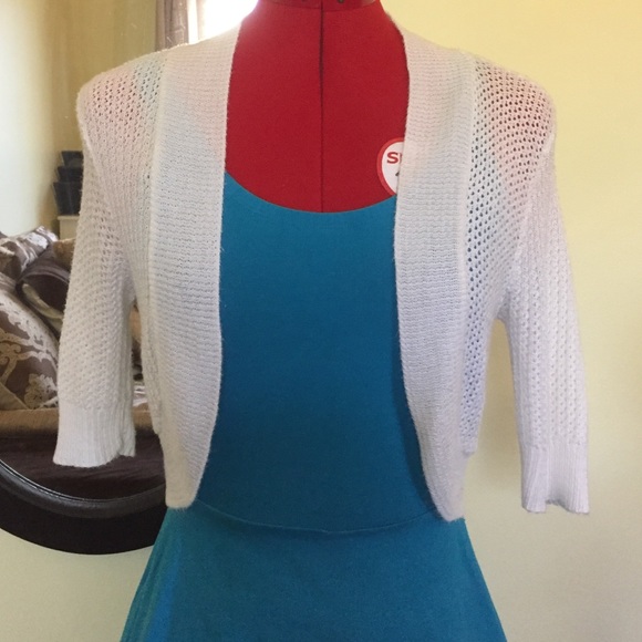 White knit shrug.