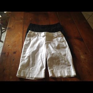 Size 4.  Black and white pants essentials!