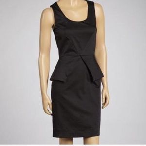Vince Cammuto black peplum dress 4 will list on Ⓜ️