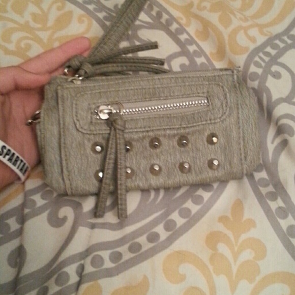 A grey studded wrestlet