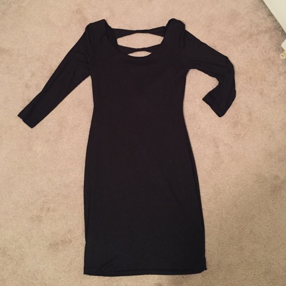 Form fitted black dress, new with tags.