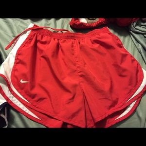 red and white nike running shorts