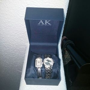 Two silver authentic AK watch