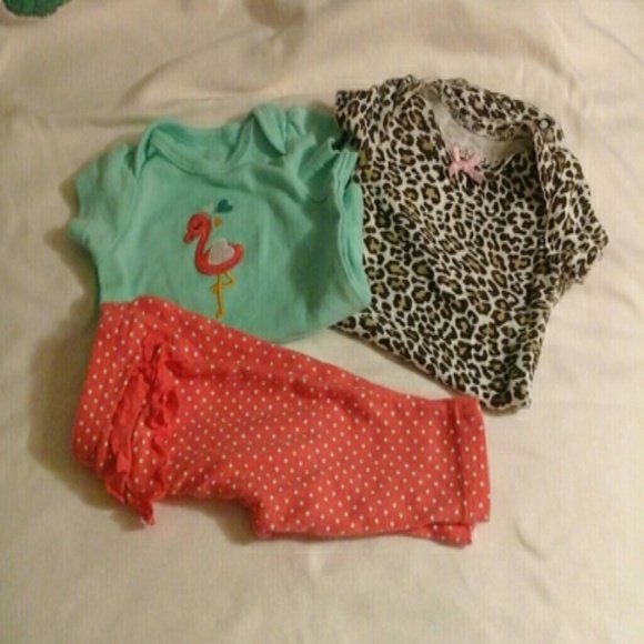one outfit and one cheetah onesie