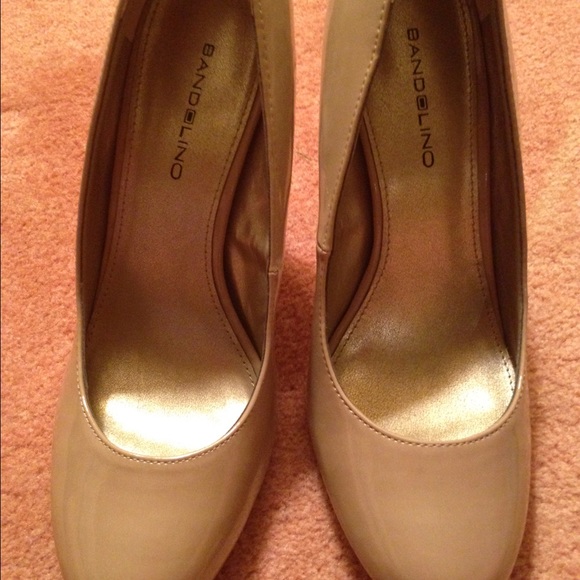 Nude heals.  Only worn once.  Size 8