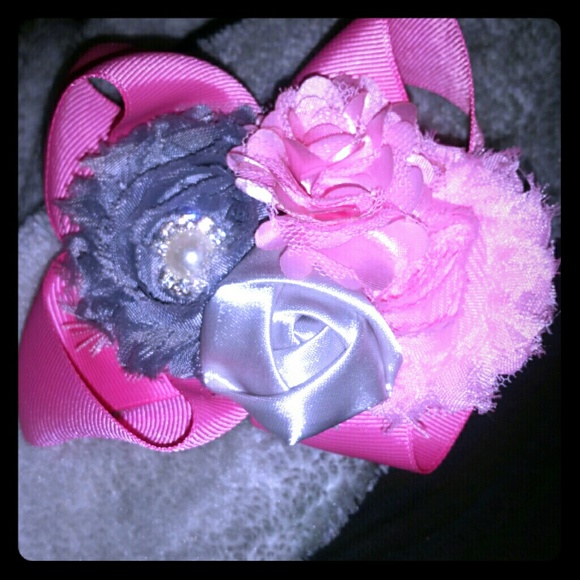 Handmade pink layered bow.