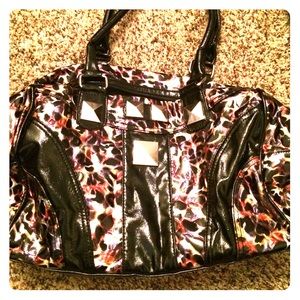 👛 black and multi colored bag.