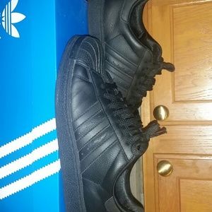 Black on black adidas superstar