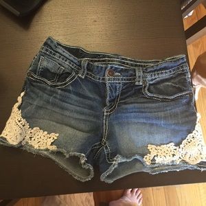 Jean shorts with lace trim