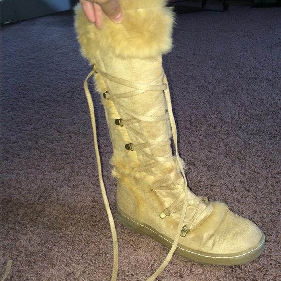 Tall, tan boots, long laces. Kind of Indian style. - Picture 1 of 4