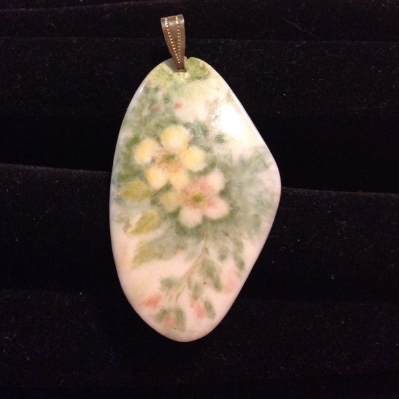 Vintage porcelain enhancer on a slider choker.
