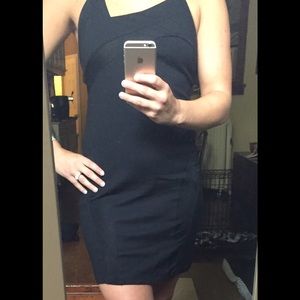 Asymmetric halter dress with cut outs