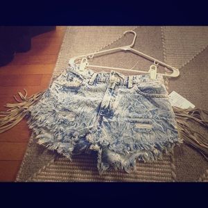 Urban outfitters fringe cut off shorts