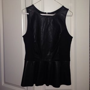 Leather front and waist flare top solid black.