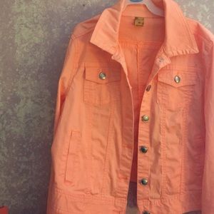 Bright peach denim jacket.