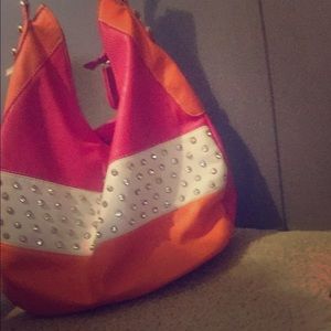 Orange, pink, and white purse with diamonds