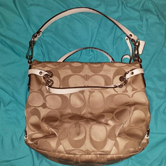 Tan and white coach hobo purse