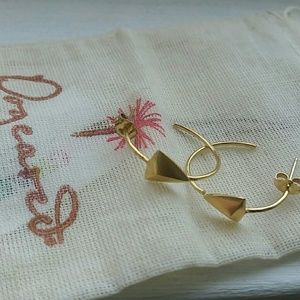 Dogeared gold dipped pyramid hoop earrings