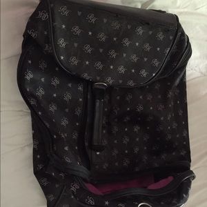 Paris Hilton rollaway bag