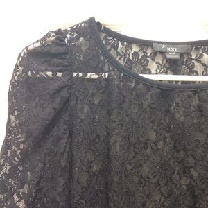 Long sleeved black lace top with ruched shoulders