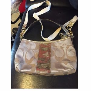 Gold coach purse