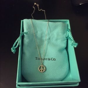 Tiffany and co peace necklace like new!!