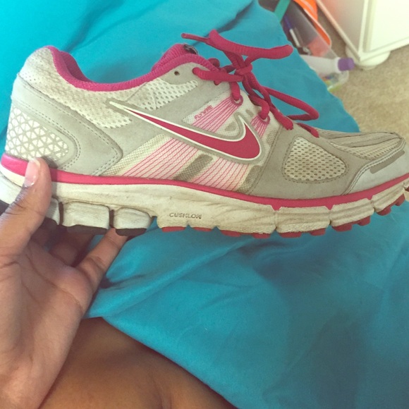 Pink and grey tennis shoes