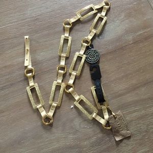 NEW gold and leather belt.