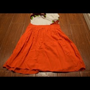 High-waisted red/orange skirt