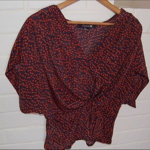 Silky, navy and red dotted blouse. Size small.