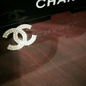 Gold tone and rhinestone brooch