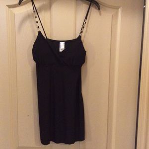 Dressy black v-neck tank w/ silver & blk details.
