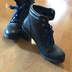 Black booties with blue laces