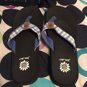 Yellow box flip flops