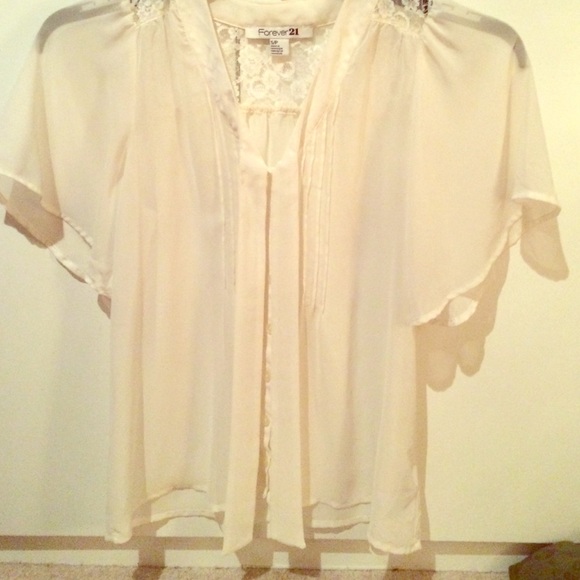 Lace accented sheer blouse