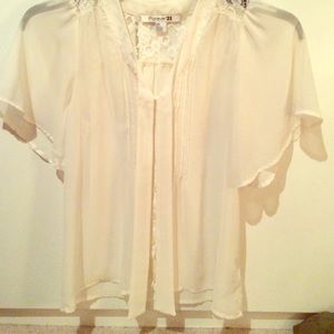 Lace accented sheer blouse