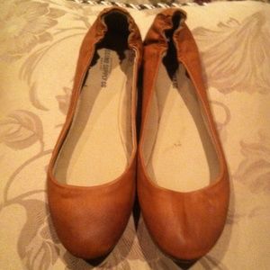 Tan slip on flats