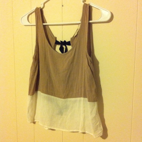 Neutral crop top with black bow detail