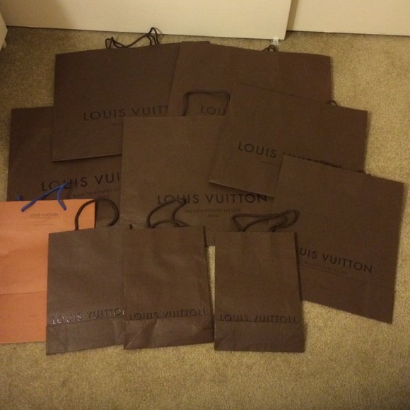 8 Louis Vuitton shopping bags