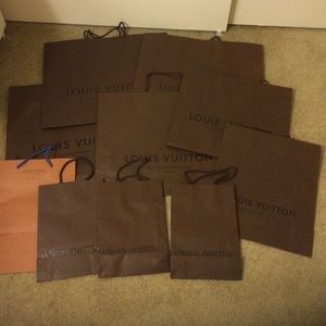 8 Louis Vuitton shopping bags