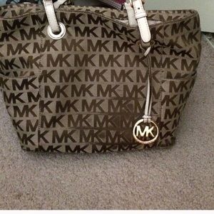 Michael Kors purse. It's simply used.