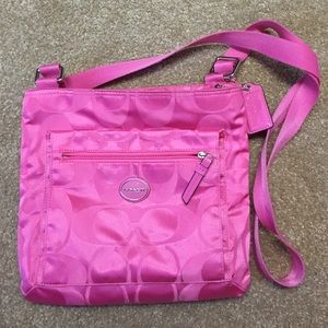 Pink over the shoulder coach