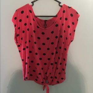 red polka dot shirt